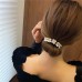 Елегантна шпилька-твістер для волосся з перлиною прикрасою  в  Интернет-магазин "Зелена Ворона" 4
