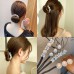 Елегантна шпилька-твістер для волосся з перлиною прикрасою  в  Интернет-магазин "Зелена Ворона" 1